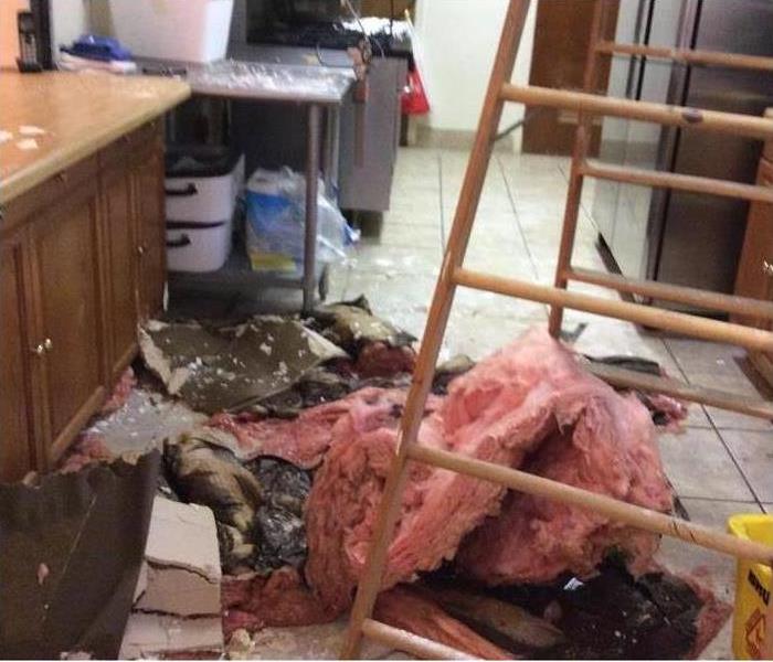 photo shows pink insulation on floor
